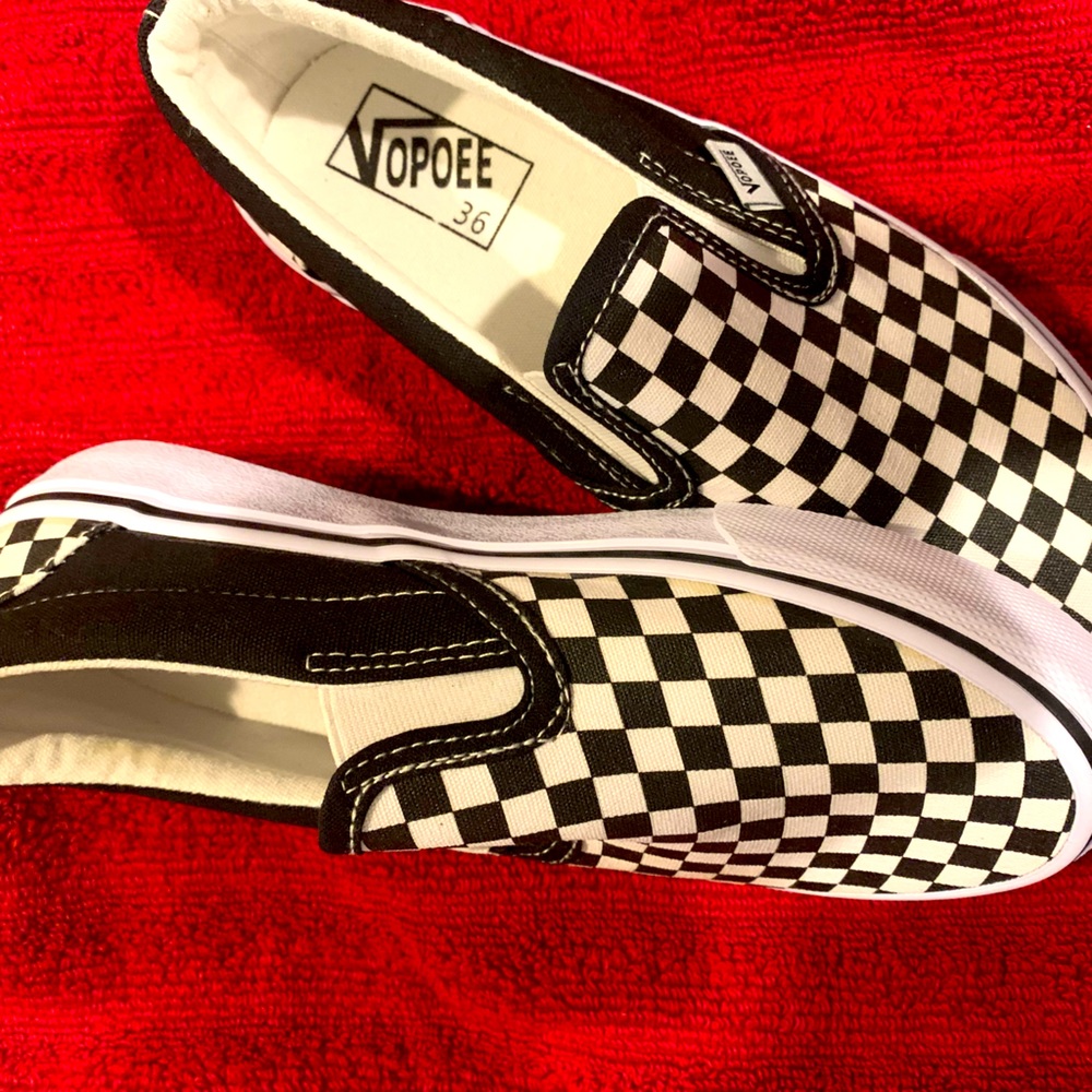 These are generic kids slip on shoes like Vans. They are NOT vans. See pics.